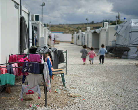 Syrian refugee camp on the outskirts of Athens. Photo by Julie Ricard on Unsplash