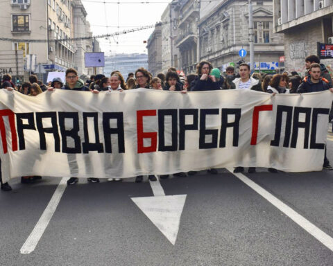 Students hold cloth banner with the slogan “Justice, Struggle, Voice” during the joint demonstration between students and retirees, February 5, 2025.